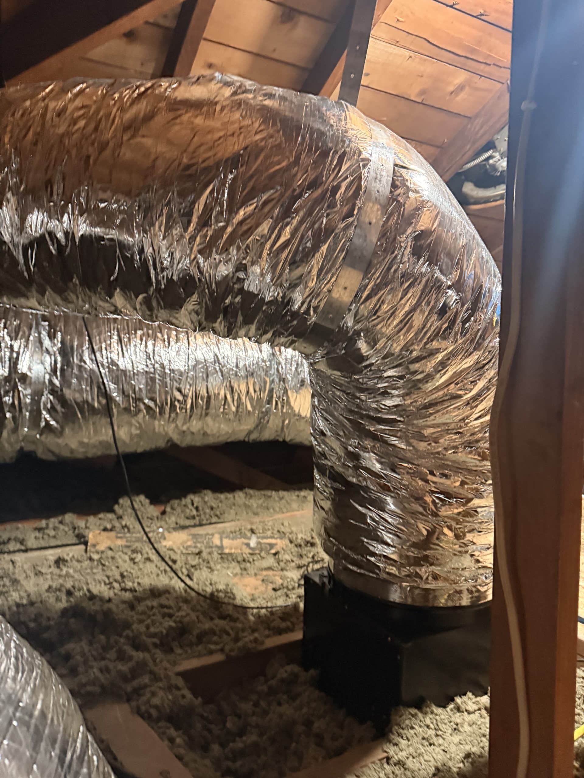 Insulated HVAC duct in attic space
