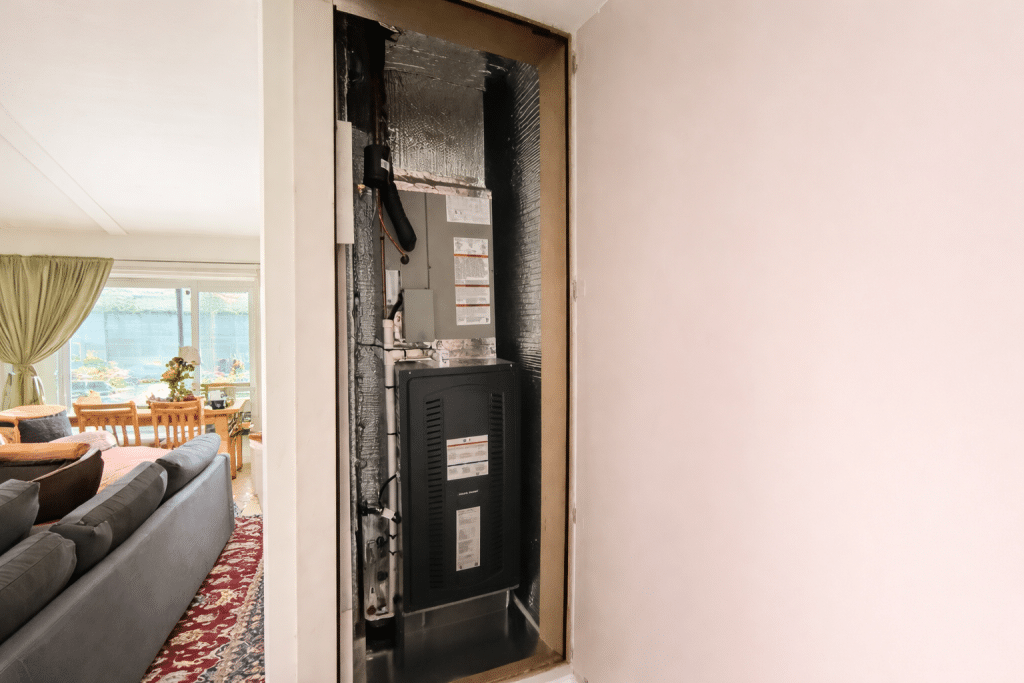 Home interior with furnace closet open