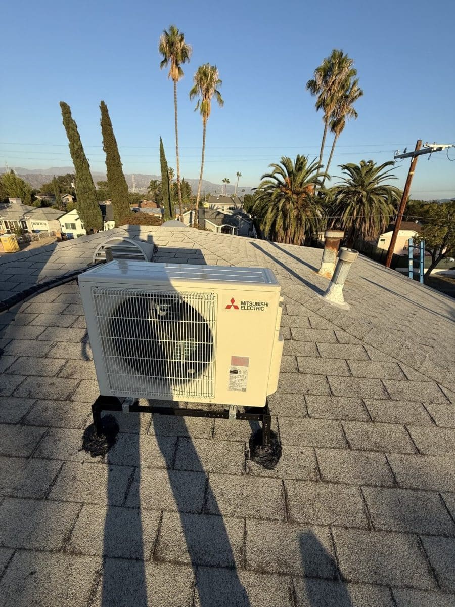 Rooftop condenser units serving a commercial building