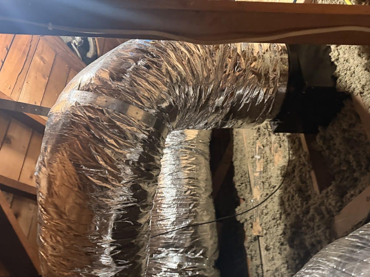 Insulated flexible HVAC ductwork in a residential attic