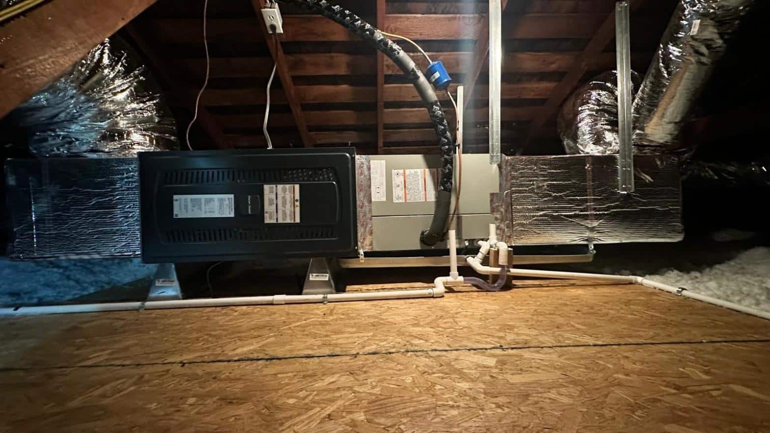 Ductless mini-split outdoor condenser unit installed beside a Southern California home exterior